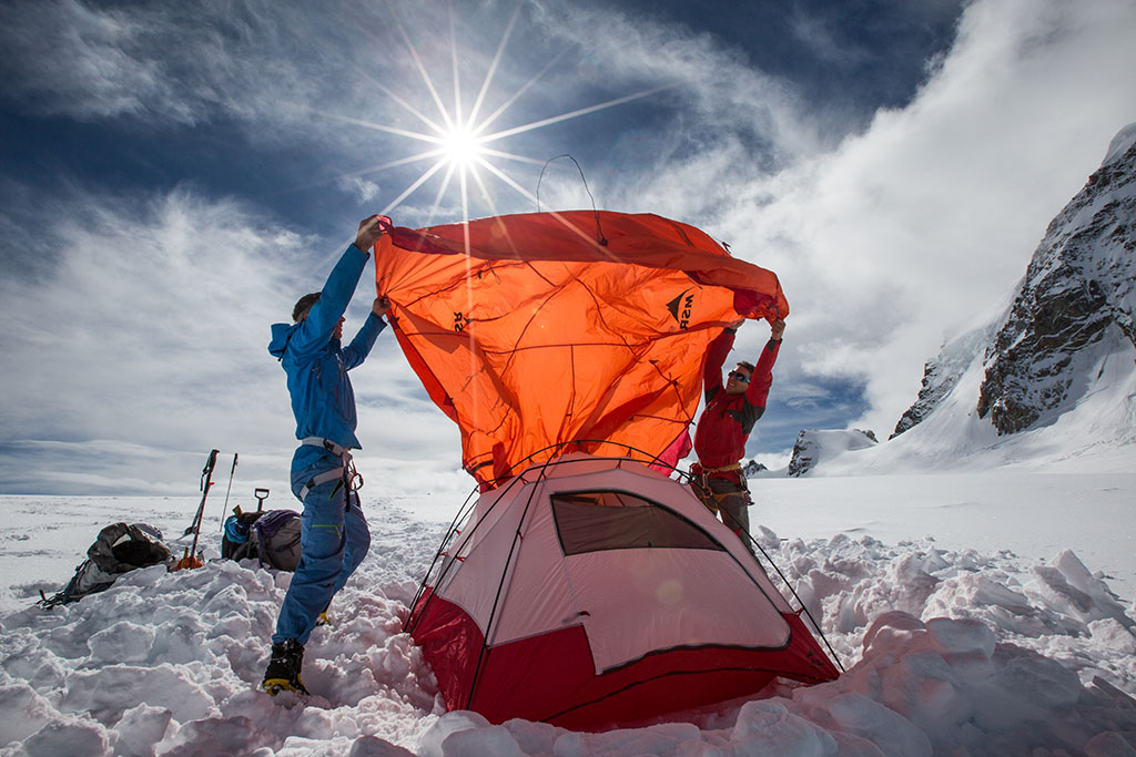 setting up remote mountaineering tent