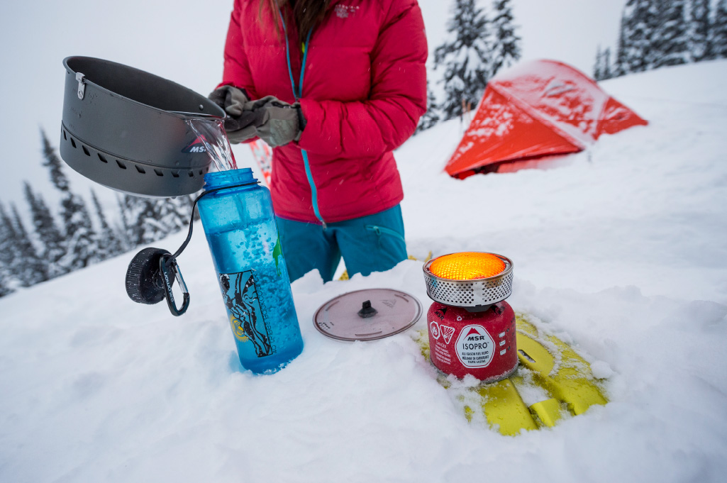 camping stove in snow