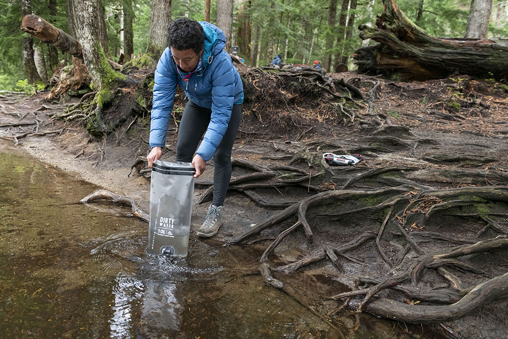 filling dirty water bag for backcountry water purifier
