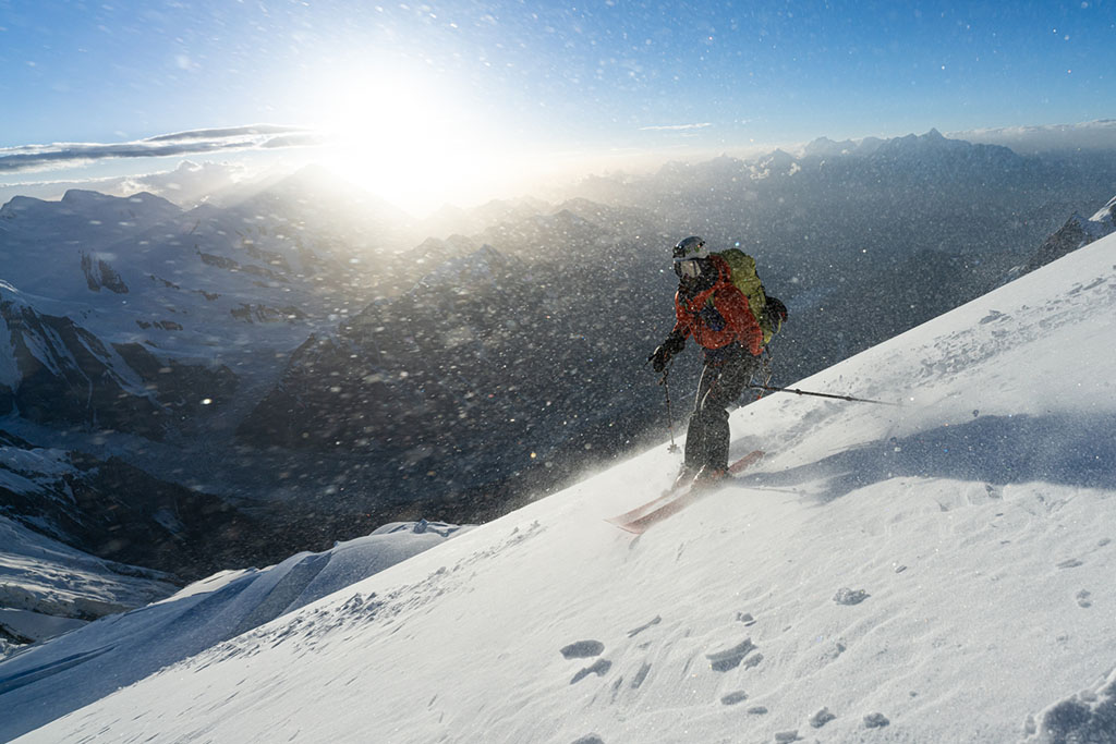 skiing down Spantik Peak