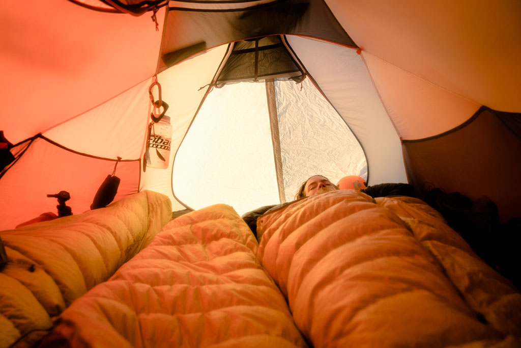 staying warm in tent while sleeping
