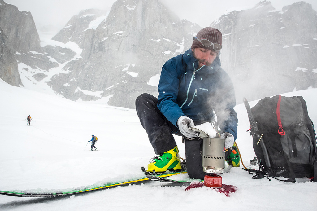 making camp coffee in the snow MSR Reactor Stove