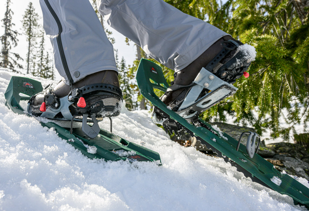 Snowshoeing up hill with MSR Evo Trail Snowshoes
