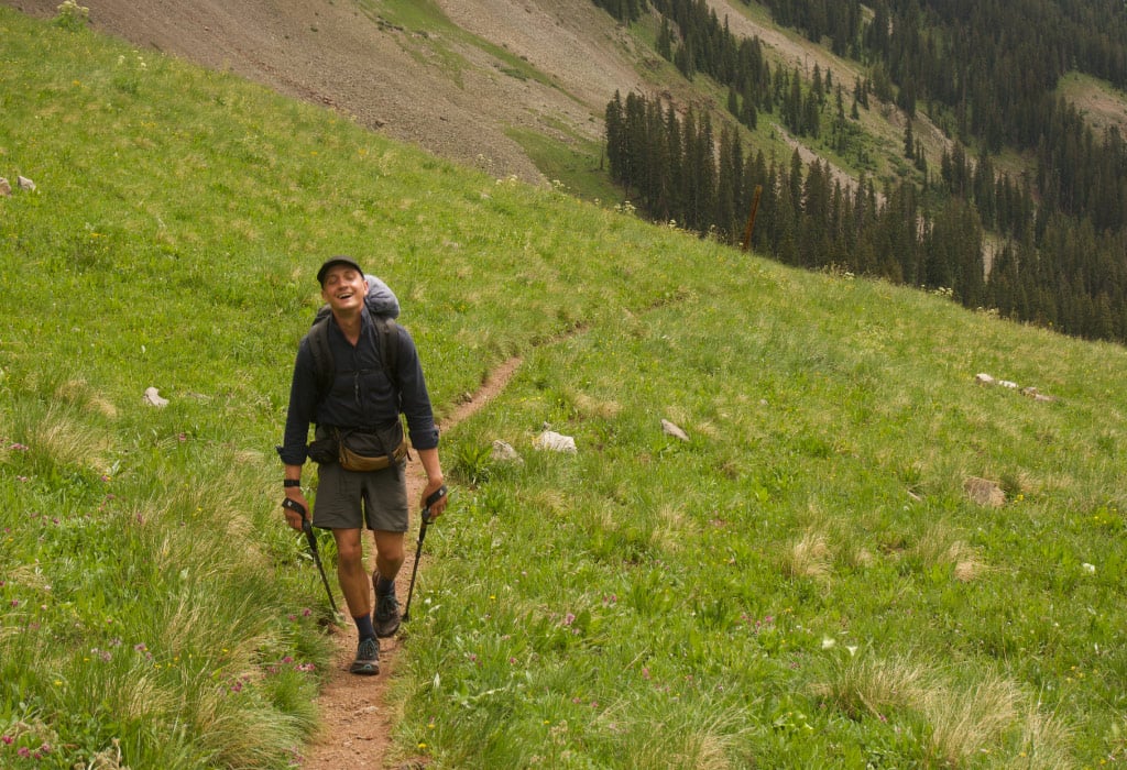 Backpacker running out of energy on the trail; bonking