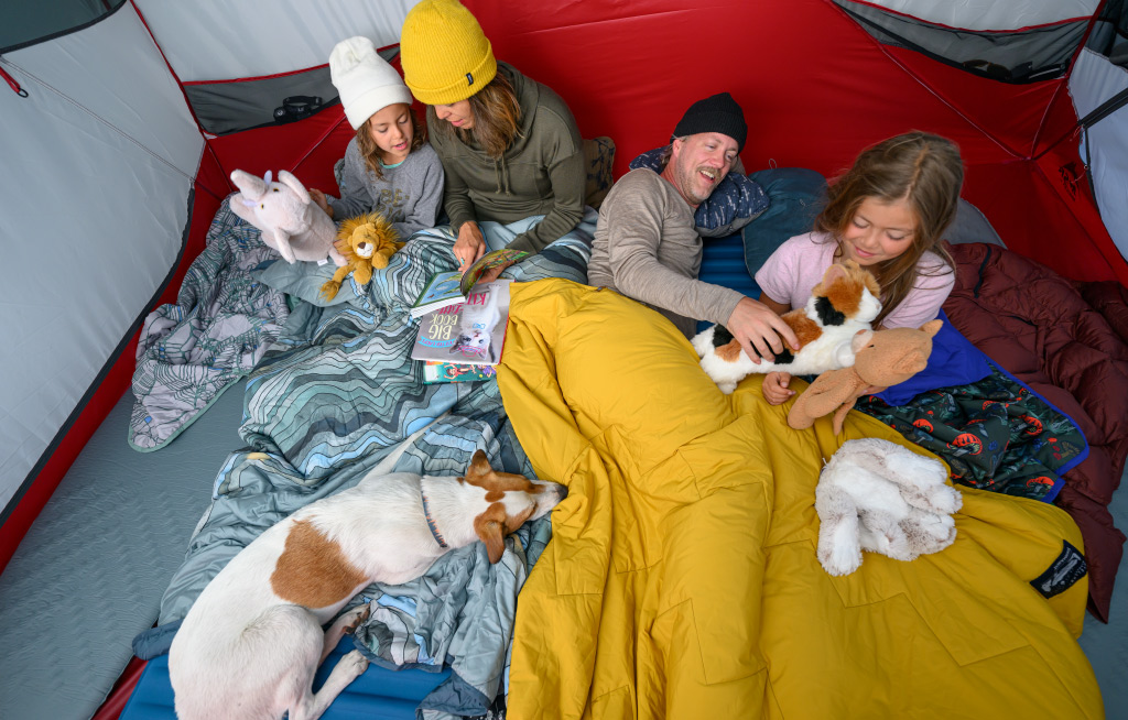 Family preparing for bed time in MSR Habiscape tent