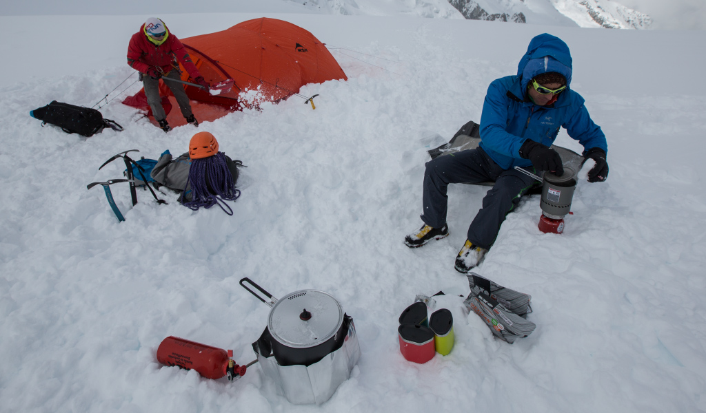 Cooking in snowy alpine camp with MSR Reflector WindScreen