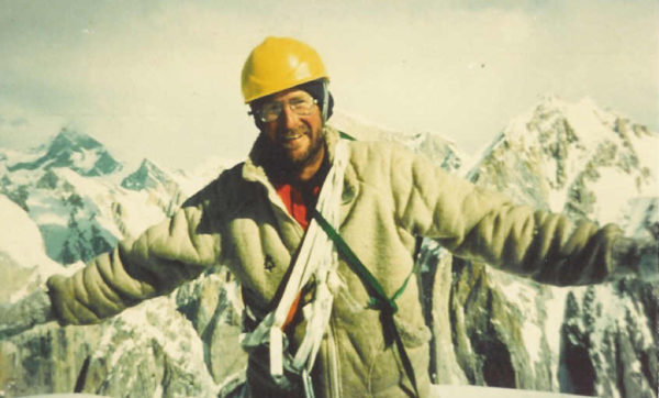 Bill Forrest poses on mountain top