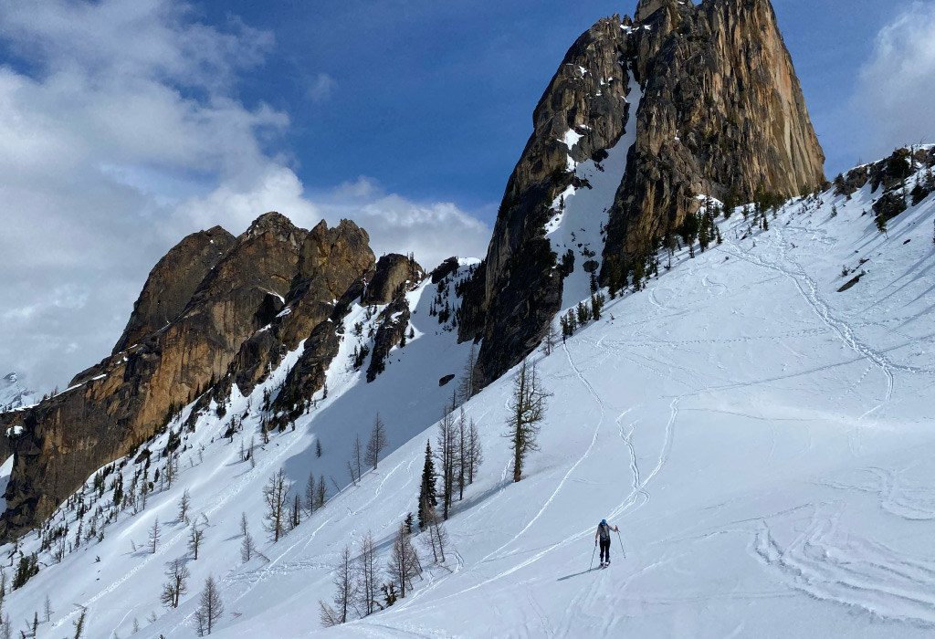 Backcountry Skier ascending steep hillside